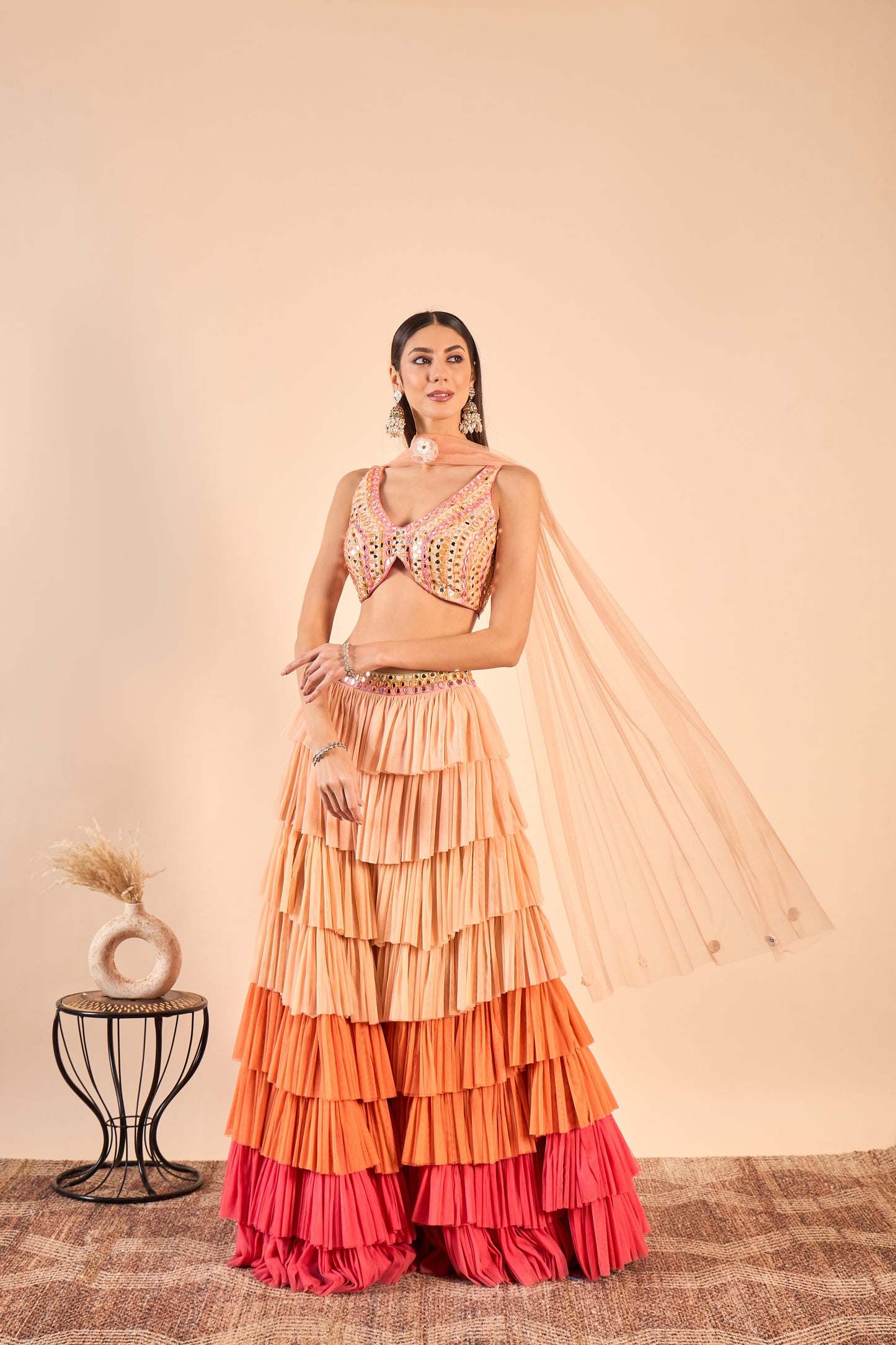 Ruffled Net Lehenga and Hand-Embroidered Mirror Work Blouse