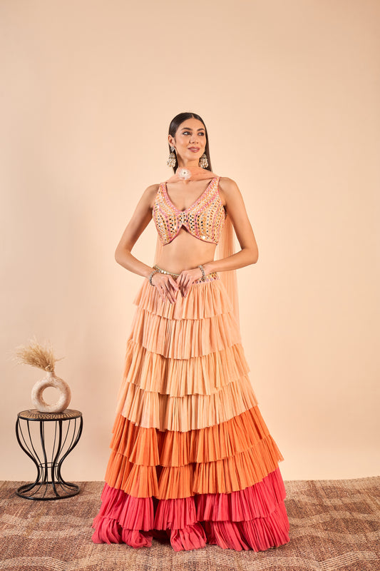 Ruffled Net Lehenga and Hand-Embroidered Mirror Work Blouse