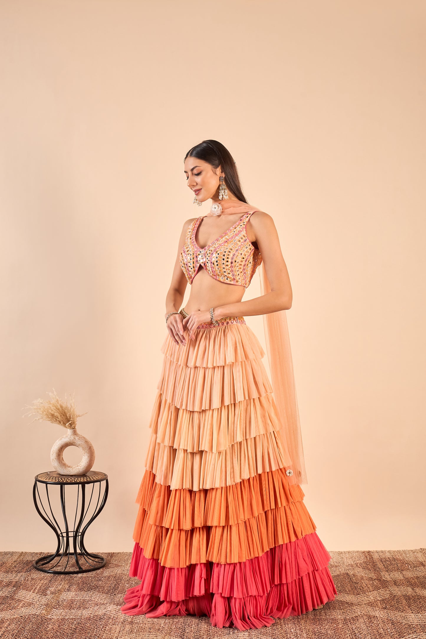 Ruffled Net Lehenga and Hand-Embroidered Mirror Work Blouse