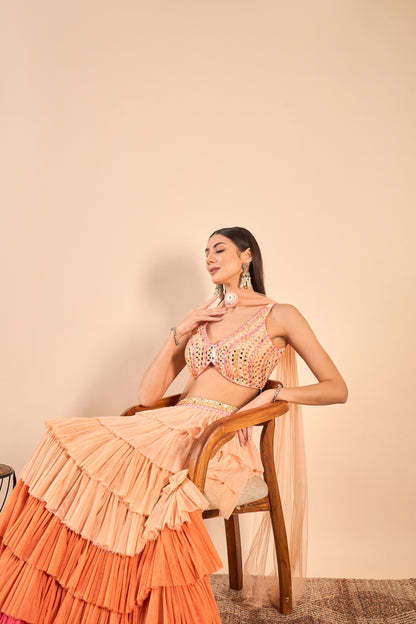 Ruffled Net Lehenga and Hand-Embroidered Mirror Work Blouse